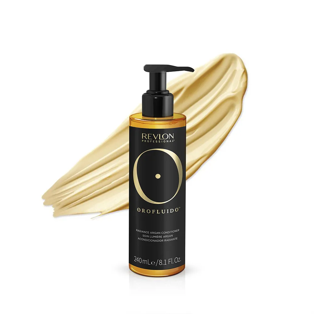 A photo of the Revlon Professional Orofluido™ Radiance Argan Conditioner bottle with a swatch of the conditioner.