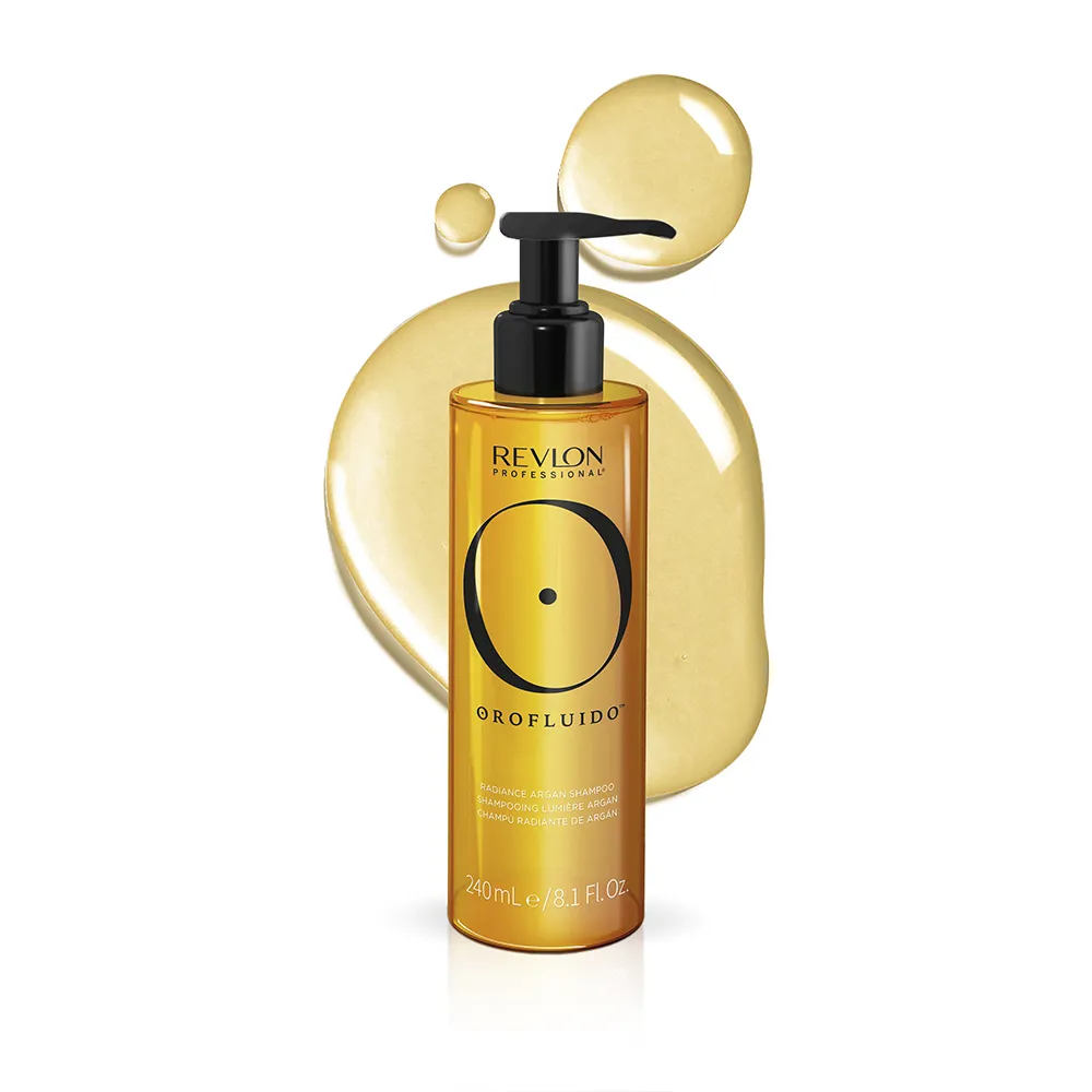 A photo of the Revlon Professional Orofluido™ Radiance Argan shampoo bottle with a swatch of the shampoo.