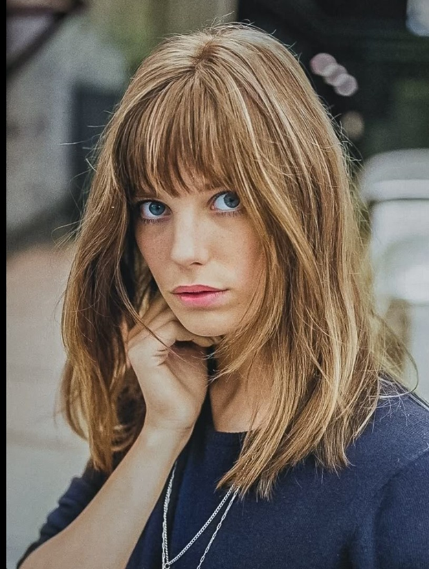  Image of Jane Birken with bangs and shoulder length hair