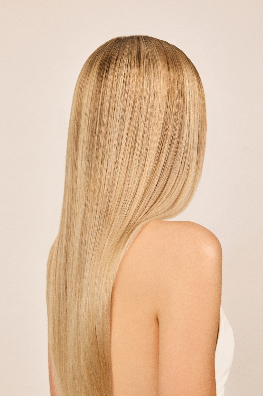 Model with straight dyed blonde hair
