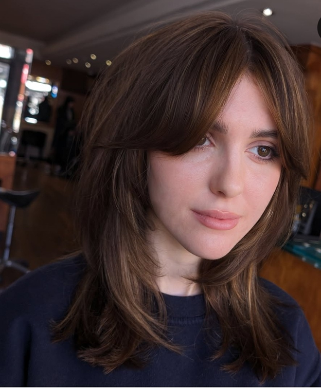 Brunette with mocha brown hair and layers